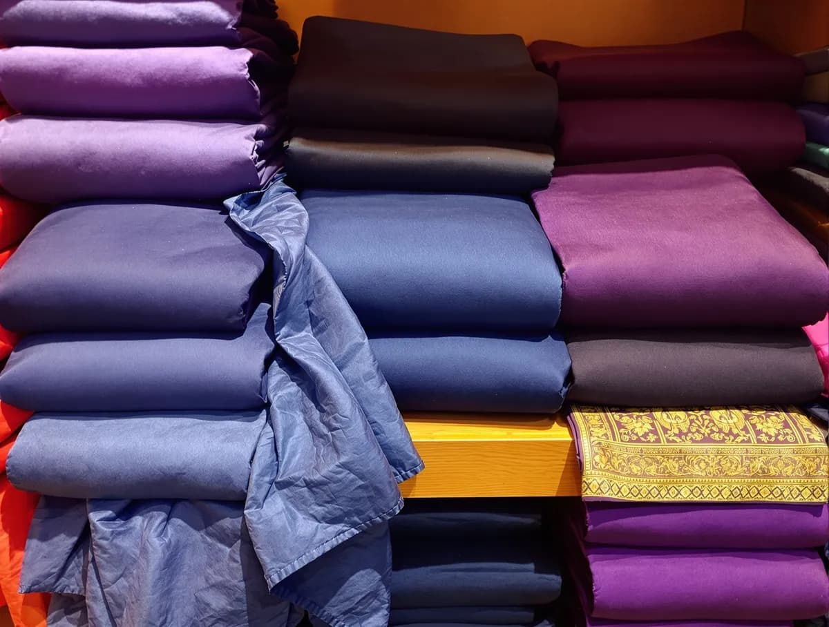 Unstitched suit fabric sets in indigo and violet with dupattas